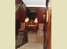 Mahogany (sapele) panelled hallway and staircase
